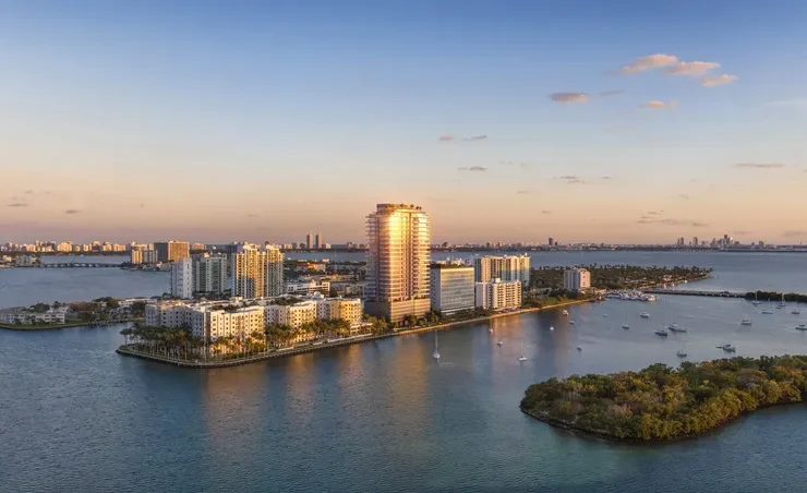 Architectural rendering of Pagani Residences overlooking Biscayne Bay in North Bay Village at sunset.