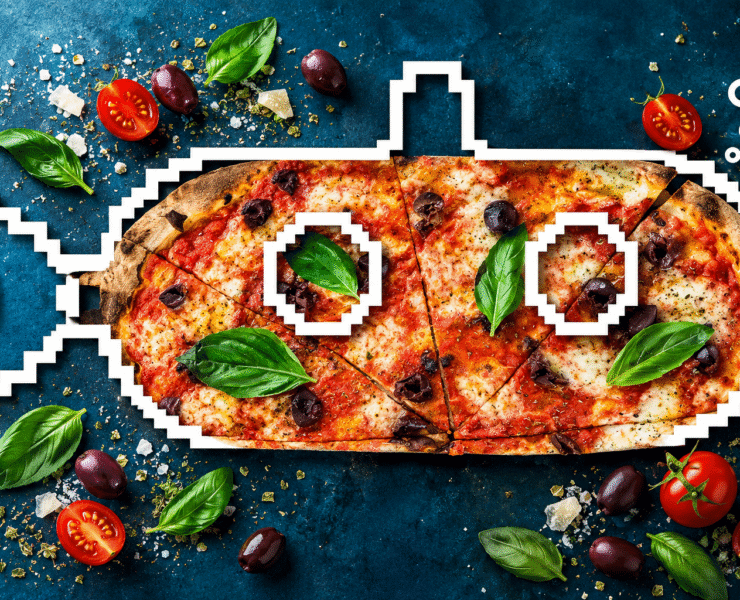 Creative pizza composition featuring fresh basil, olives and a submarine design in North Bay Village.